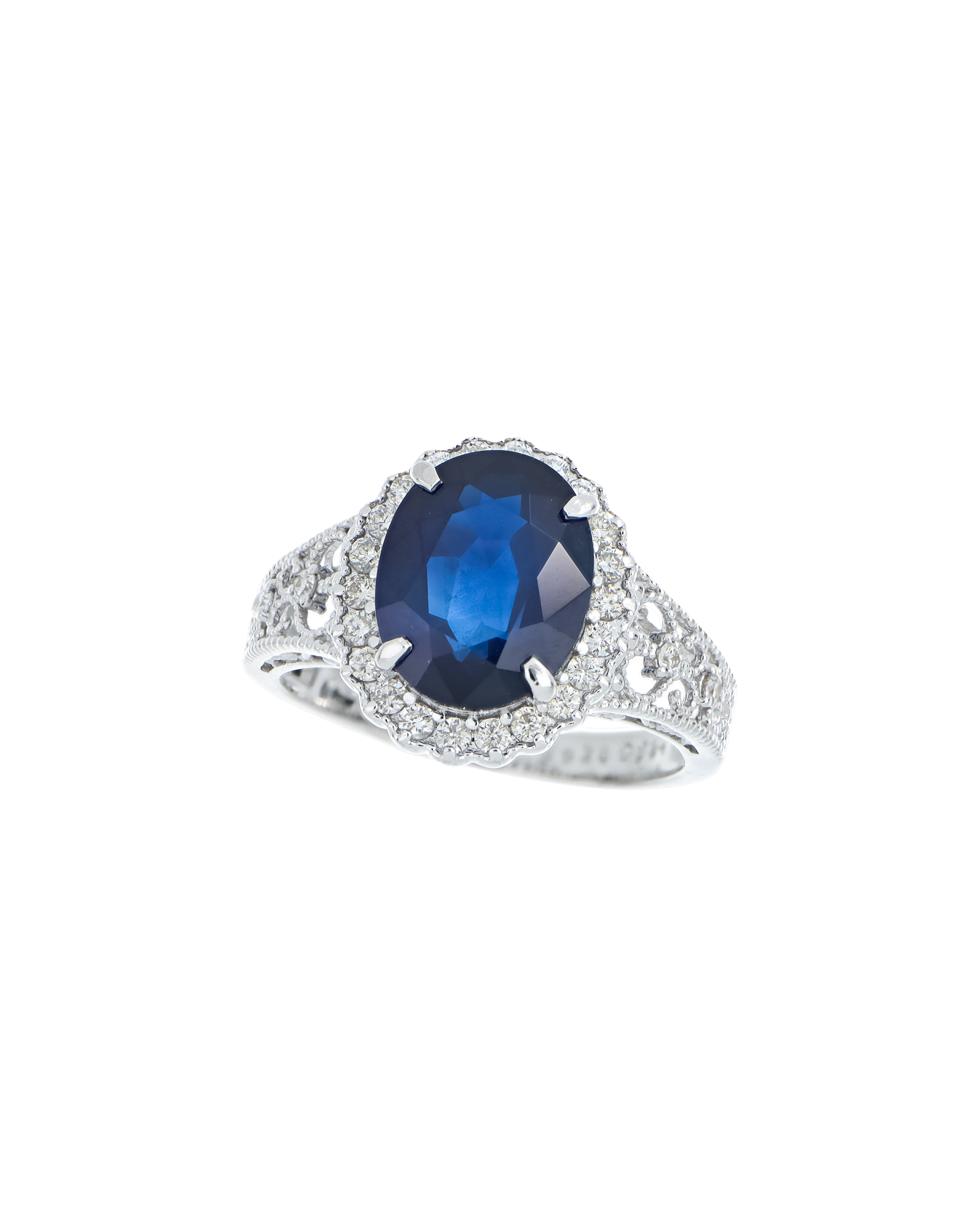 Blue Sapphire Platinum Ring With Diamond Halo