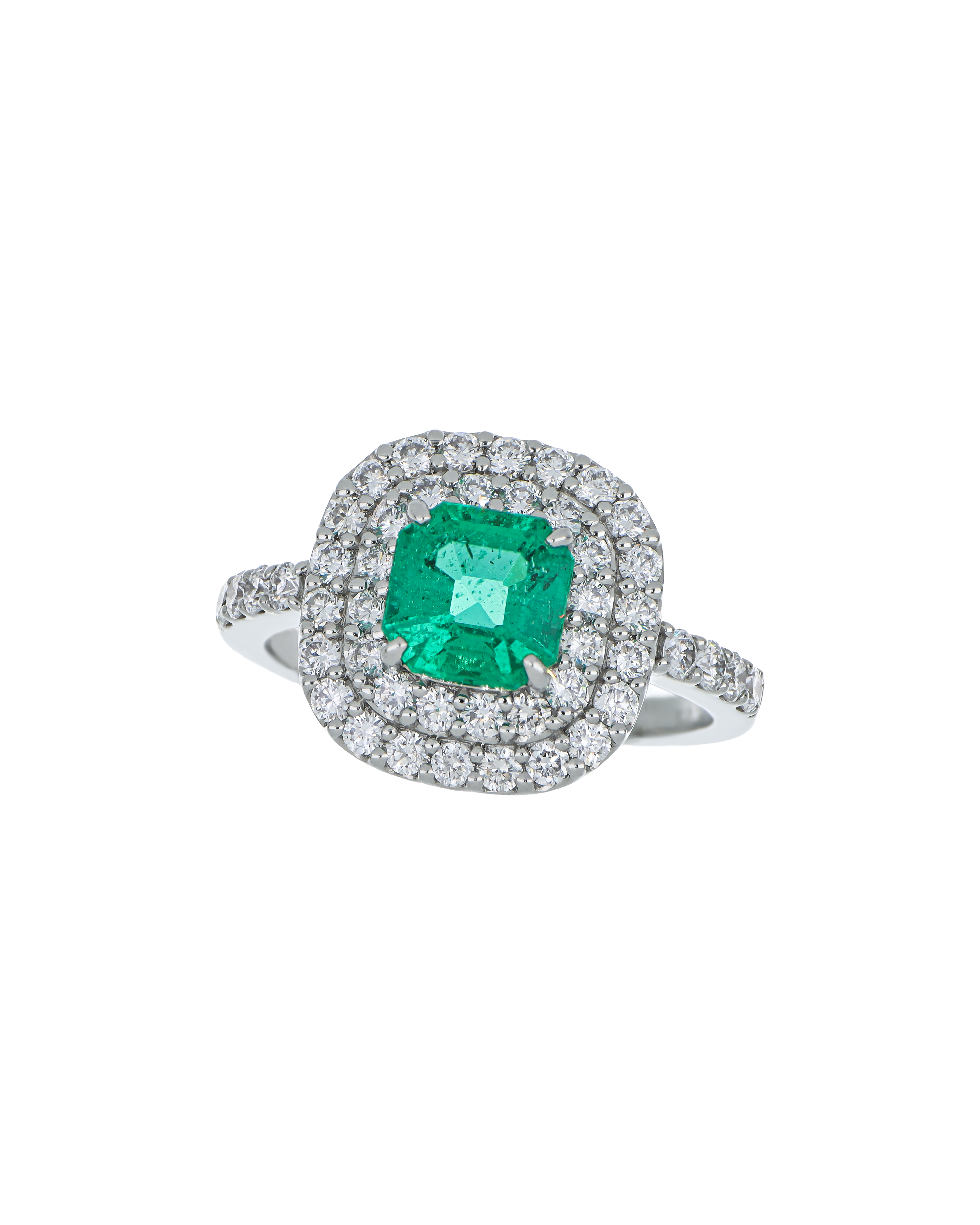 Designer Emerald Platinum Ring With Twin Diamond Frame