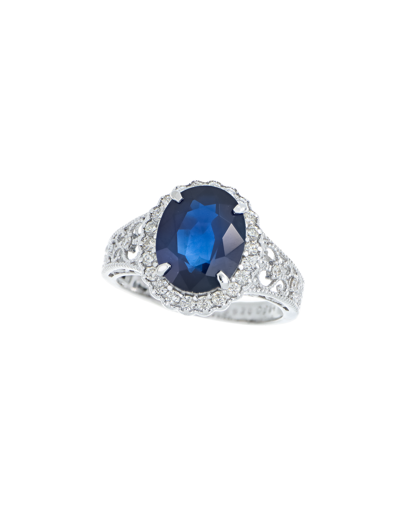 Blue Sapphire Platinum Ring With Diamond Halo