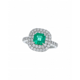 Designer Emerald Platinum Ring With Twin Diamond Frame
