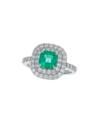Designer Emerald Platinum Ring With Twin Diamond Frame