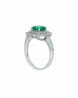 Designer Emerald Platinum Ring With Twin Diamond Frame